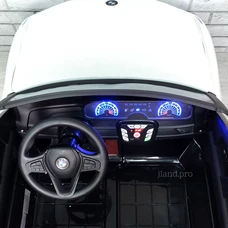 Двухместный детский электромобиль M 6364EBLR-1 белый BMW с четырьмя моторами фото 63